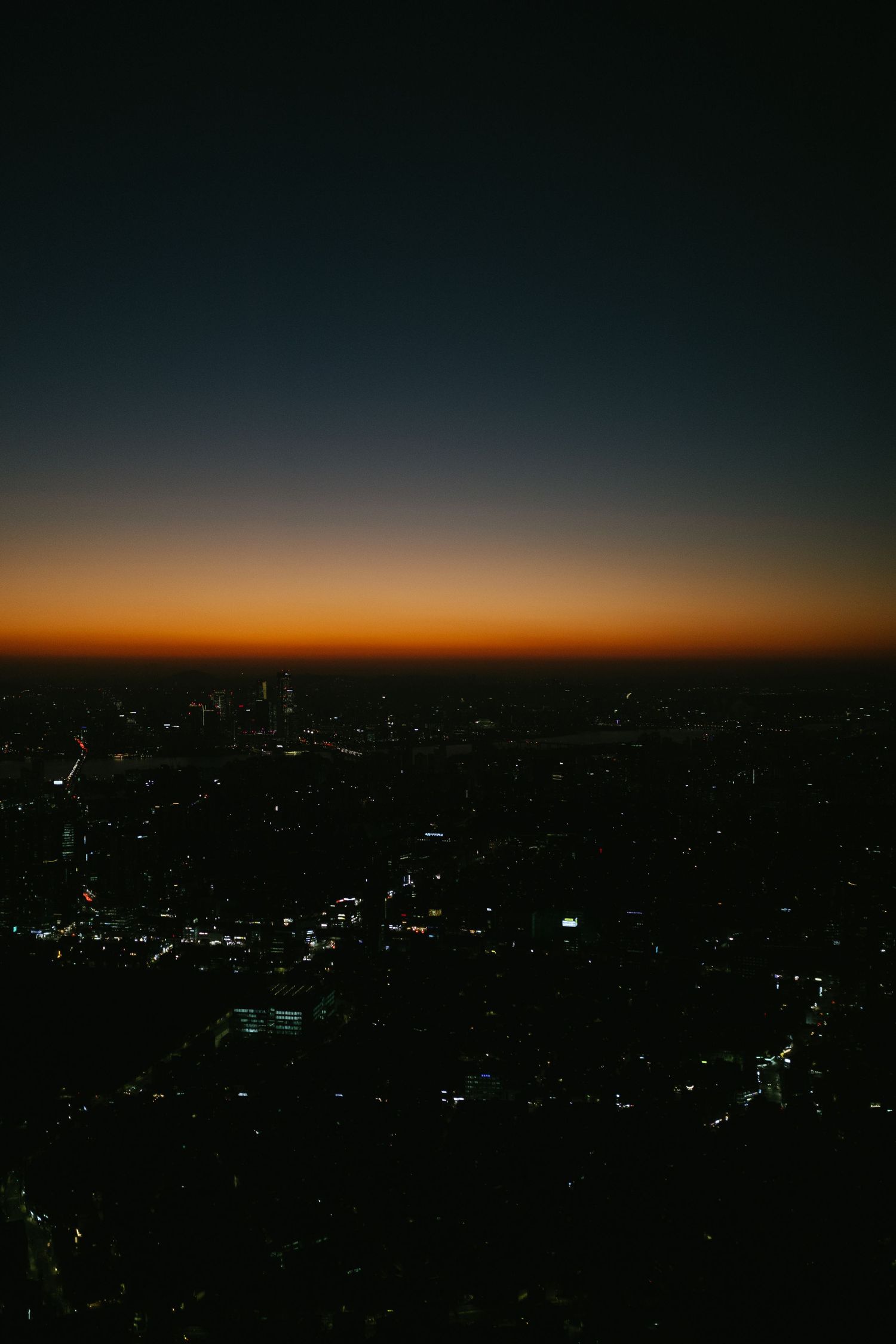 Travel photo taken at sunset at the top of N Seoul Tower in Seoul, South Korea