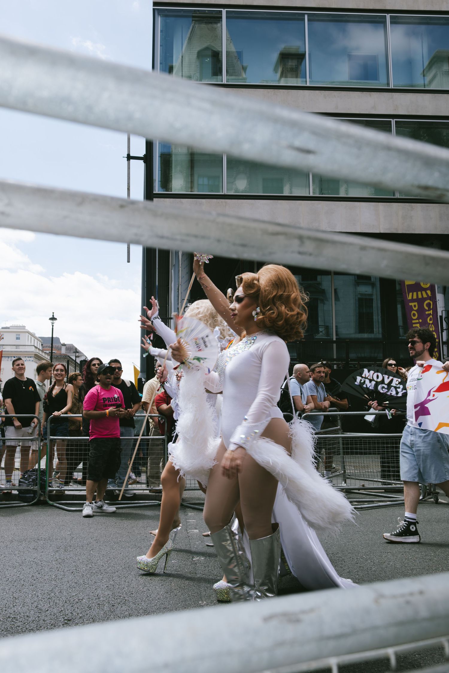 People marching in the pride parade in the streets of London