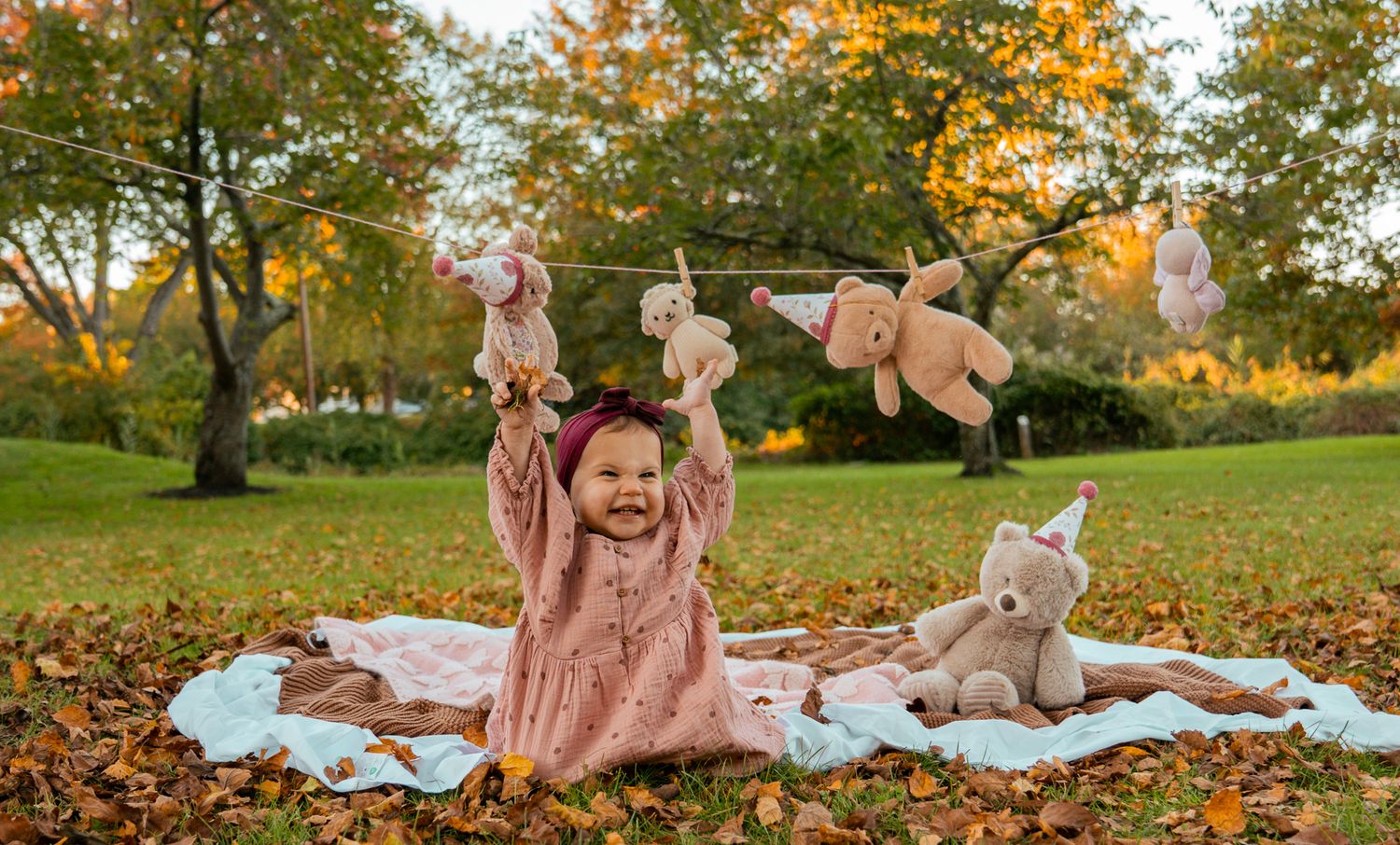baby girl with fall background