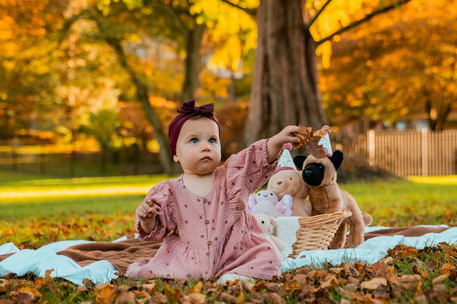 baby girl with fall background