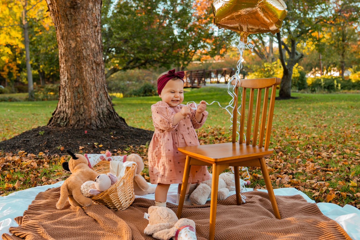 baby girl with fall background