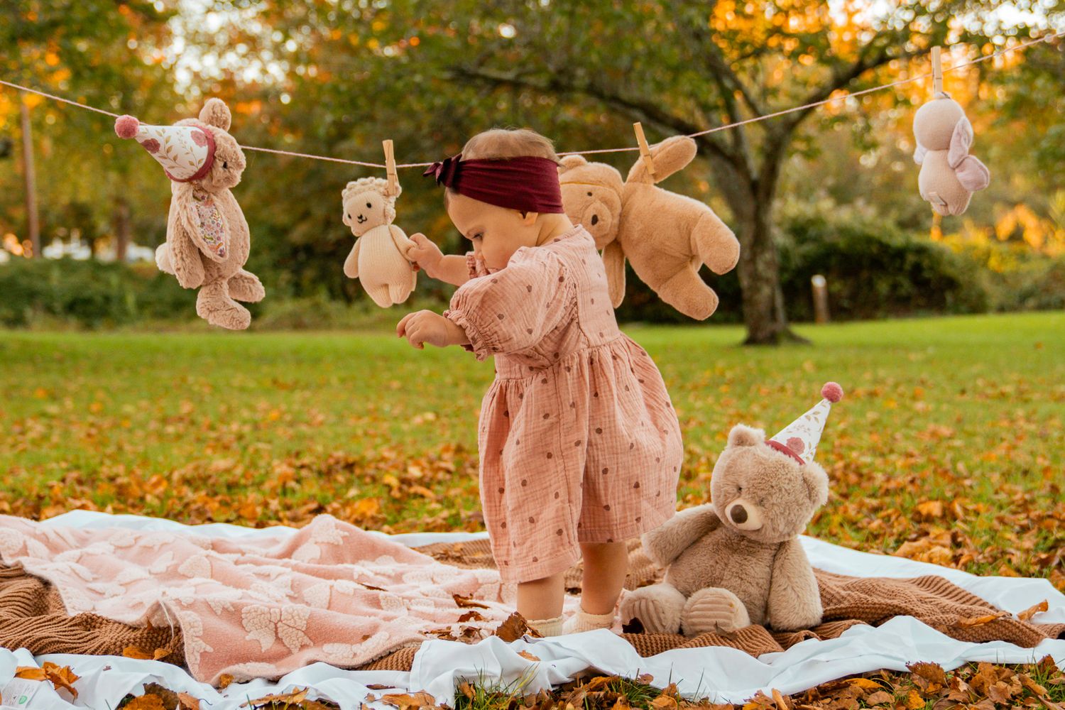 baby girl with fall background