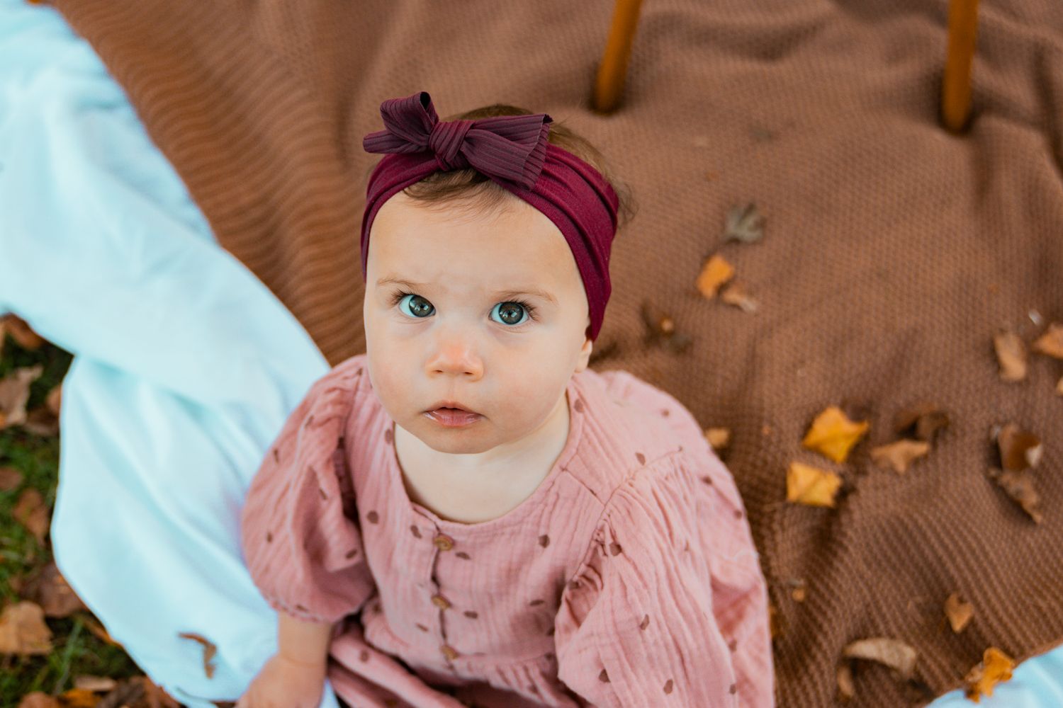 baby girl with fall background