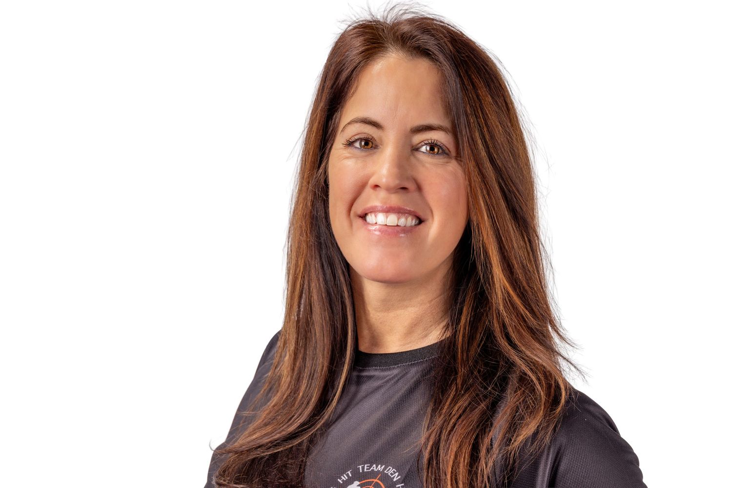 Professional headshot portraits of someone with long brown hair and warm smile against light background.