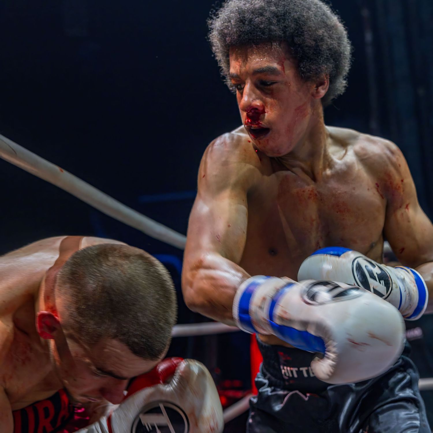 Dynamic boxing match action shots showing fighters exchanging punches in a professional ring setting.