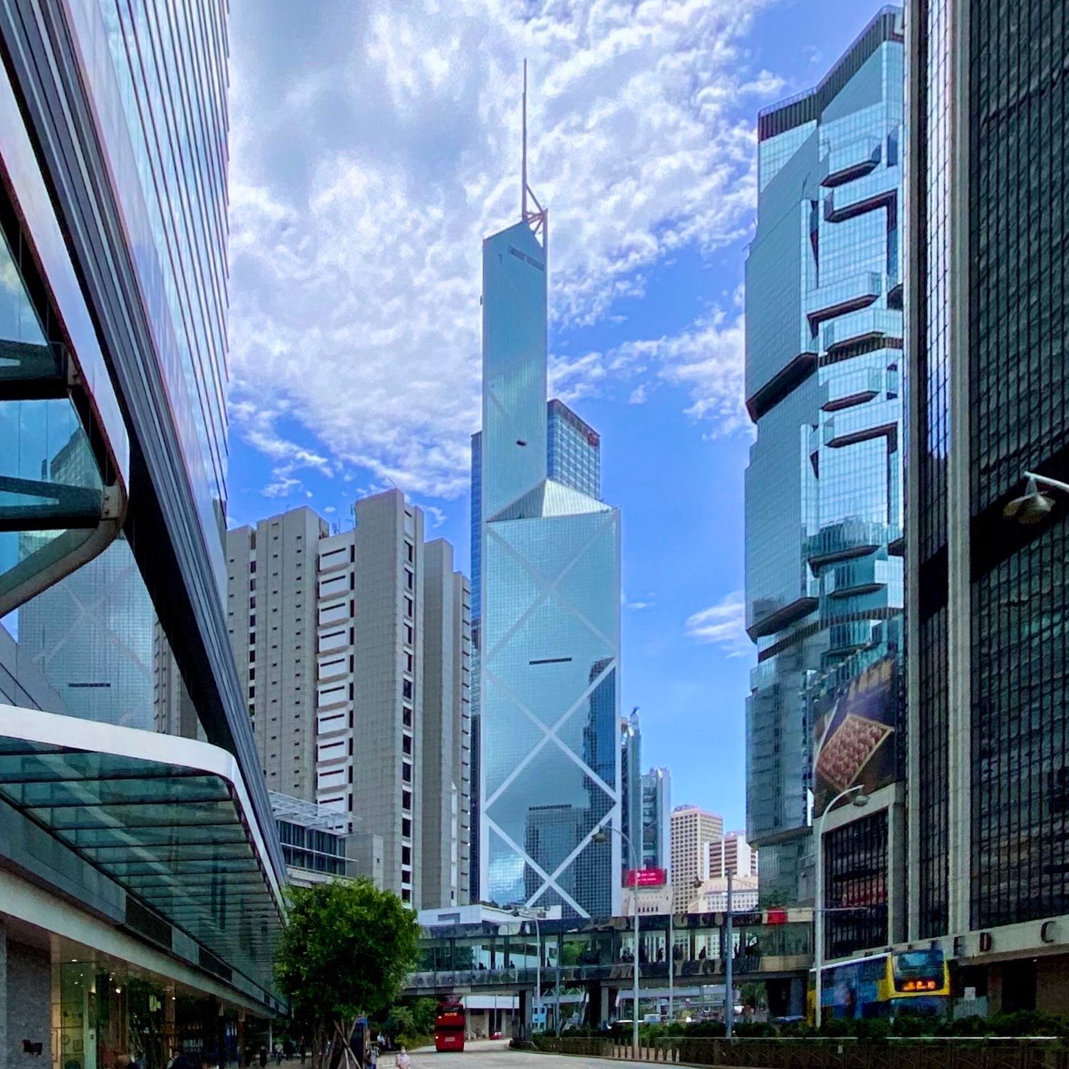 Modern skyscrapers including Bank of China Tower and other landmarks in Hong Kong's financial district.