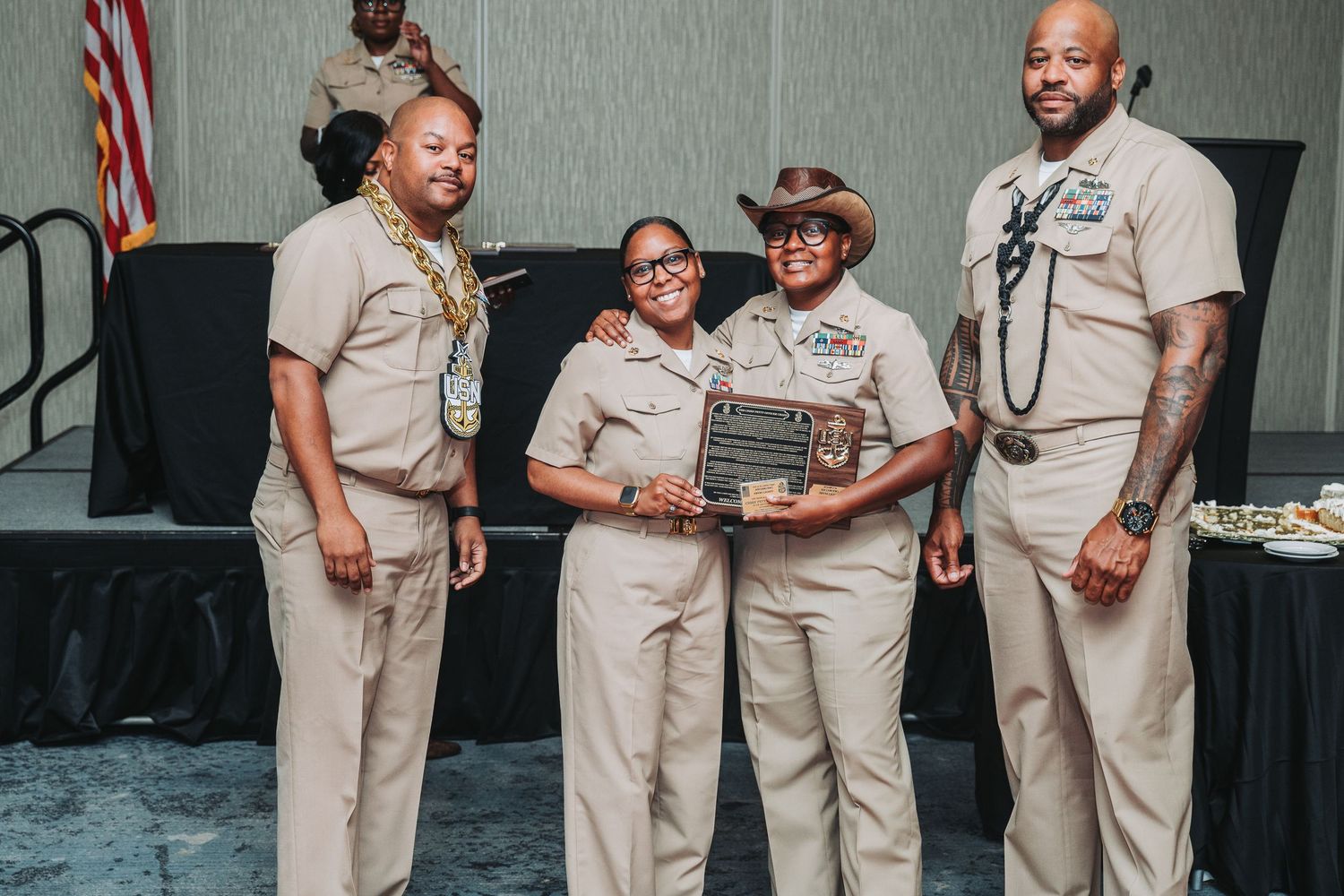 USS George HW Bush FY26 Khaki Ball presents awards and plaques to new Chief Petty Officers.