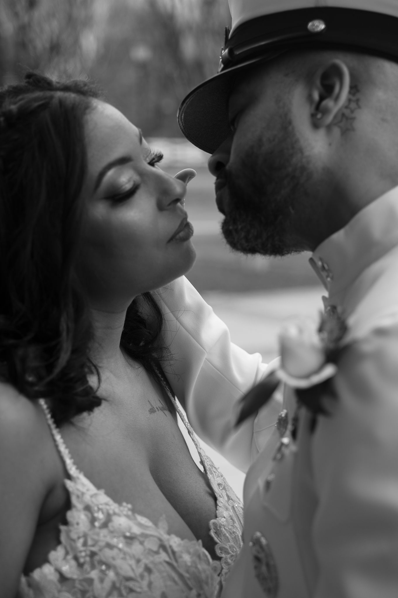 Romantic black and white portrait series showing intimate moments between a couple.