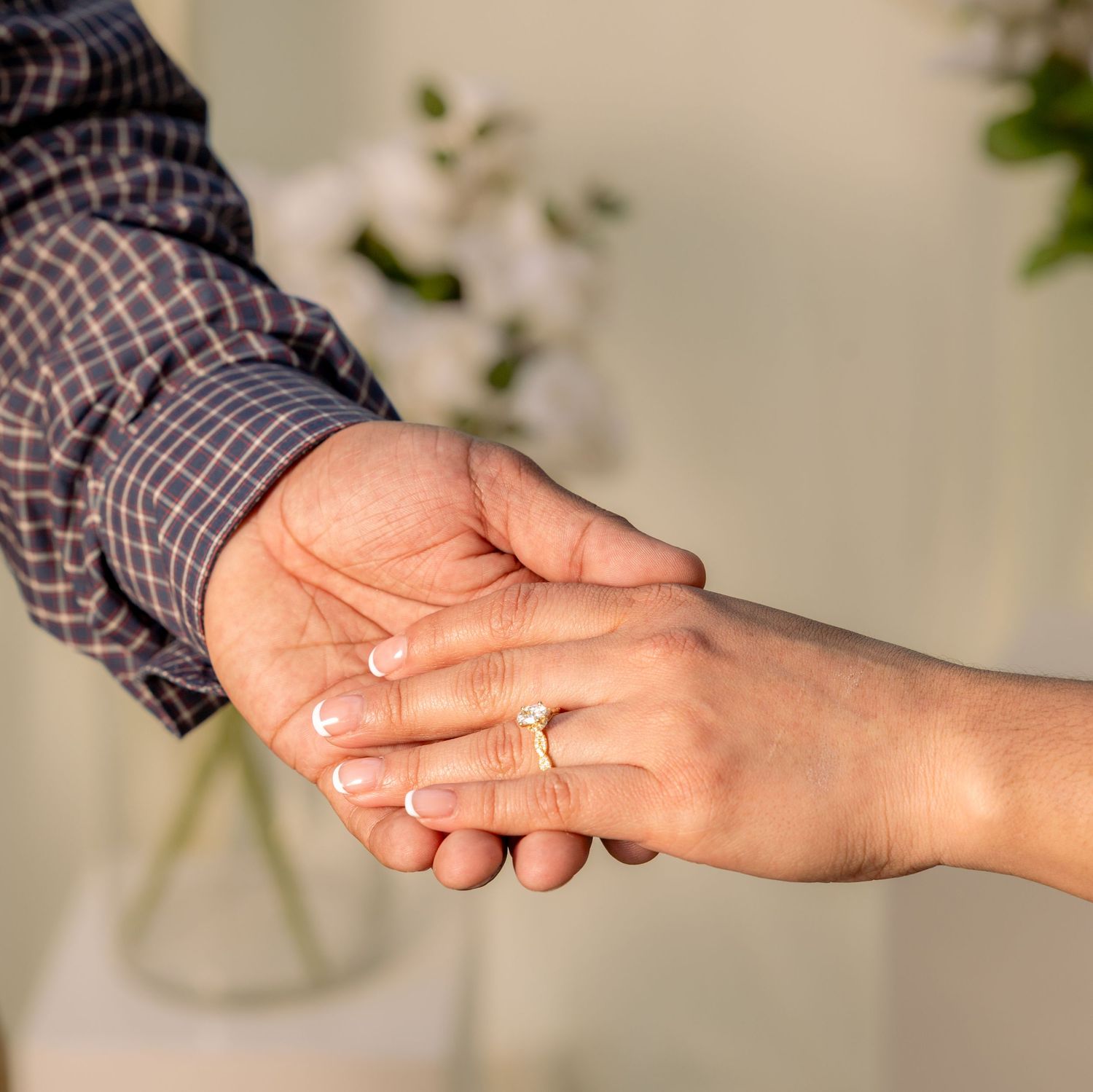 Series of hands reaching out and touching in natural lighting.