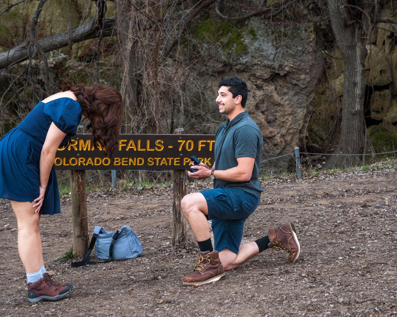 A sequence of stretching exercises demonstrated on a dirt path near rocky terrain and trees.