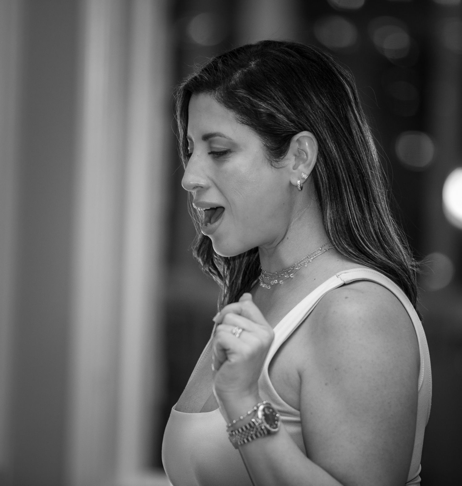 Black and white portraits showing emotional expressions and candid reactions.