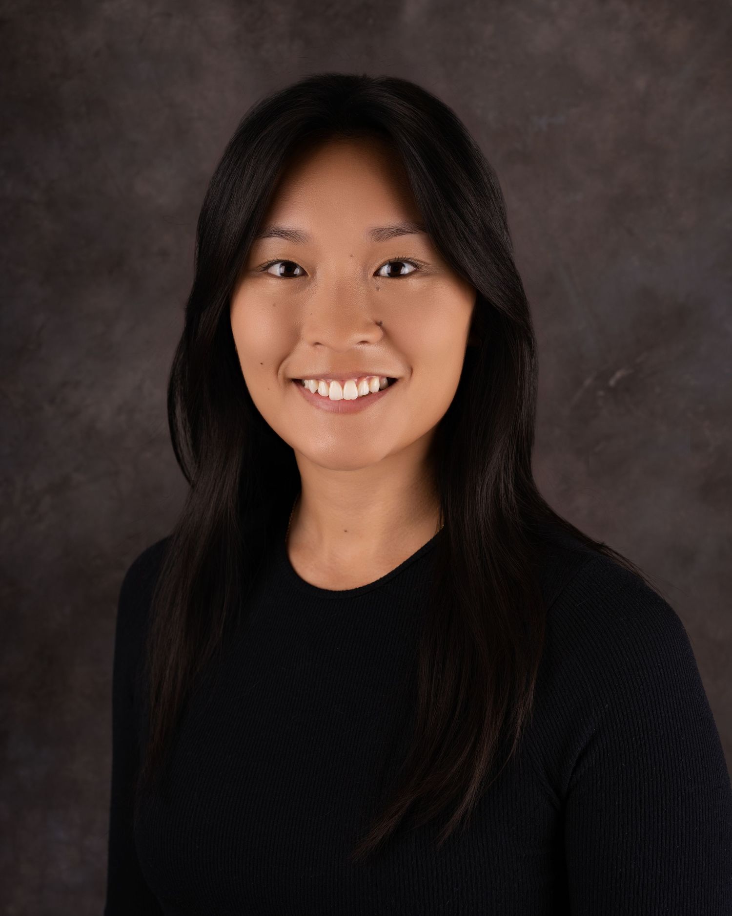 Portrait series showing different expressions and angles against dark background.