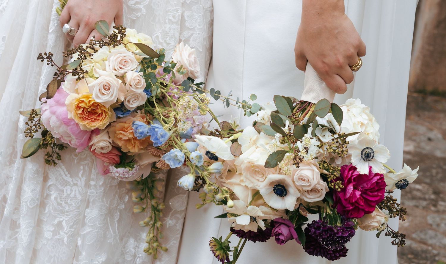 A collection of elegant wedding bouquets featuring blush, white and purple flowers arranged in a romantic style.