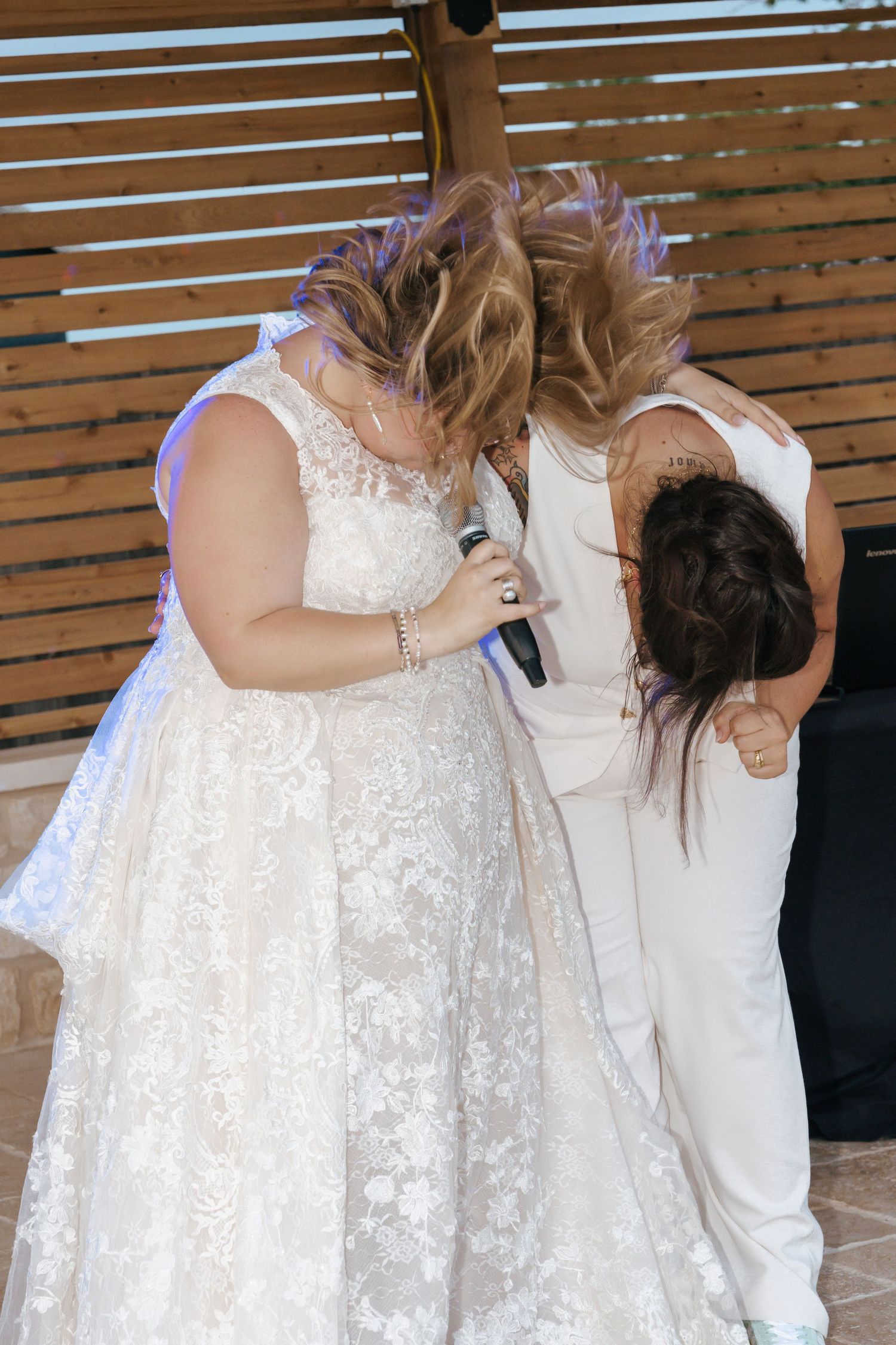 A series of wedding photos showing a couple dancing together in formal attire with the bride wearing a white lace dress.