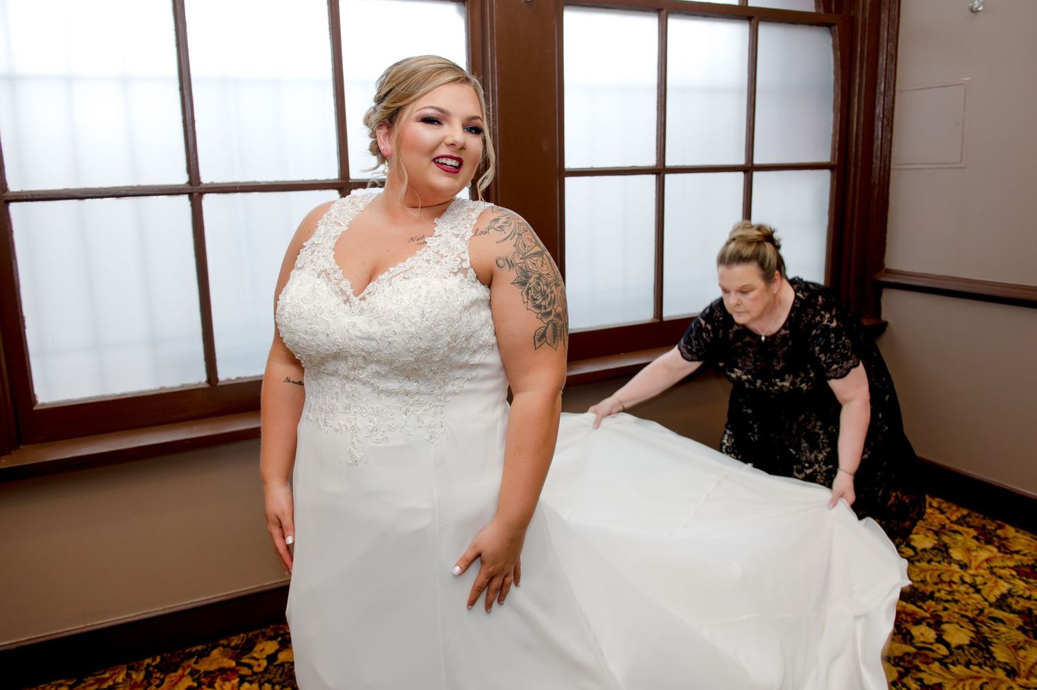Wedding dress and preparation moments captured during the getting ready process.