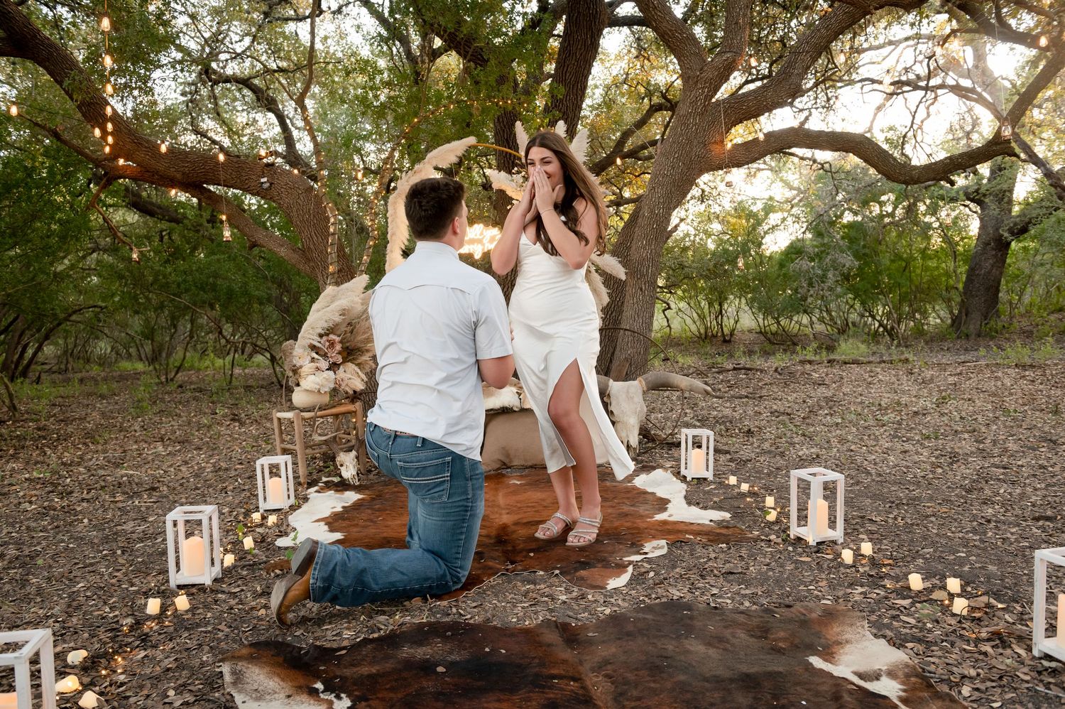 Romantic outdoor scene with couple surrounded by decorative elements and soft lighting.