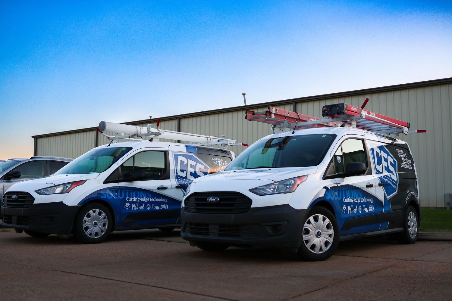 image of company vans at sunset