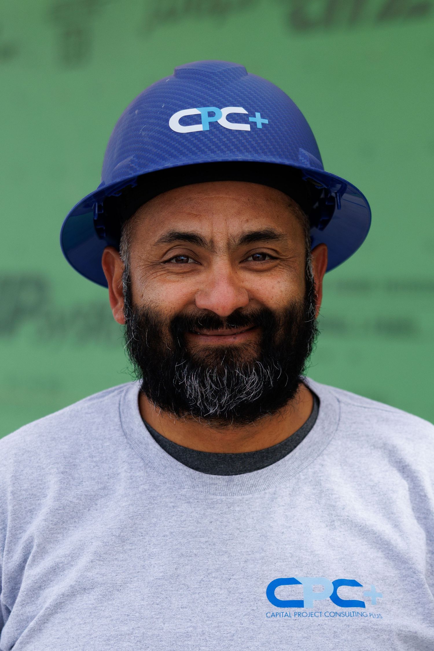 man with a beard wearing a hardhat