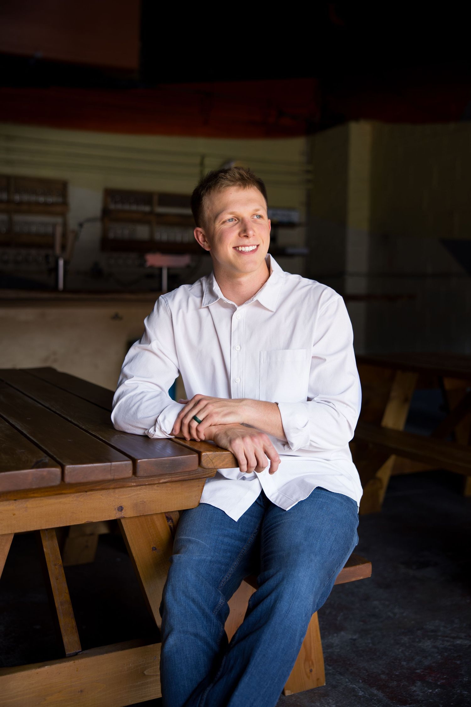 image of man in white shirt smiling