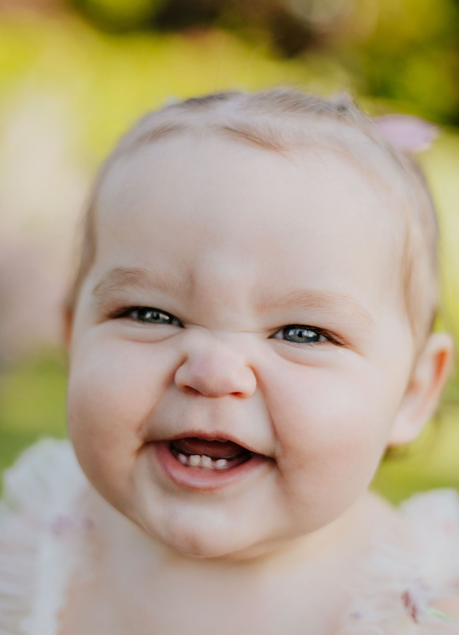 Cute smile from toddler for a birthday session