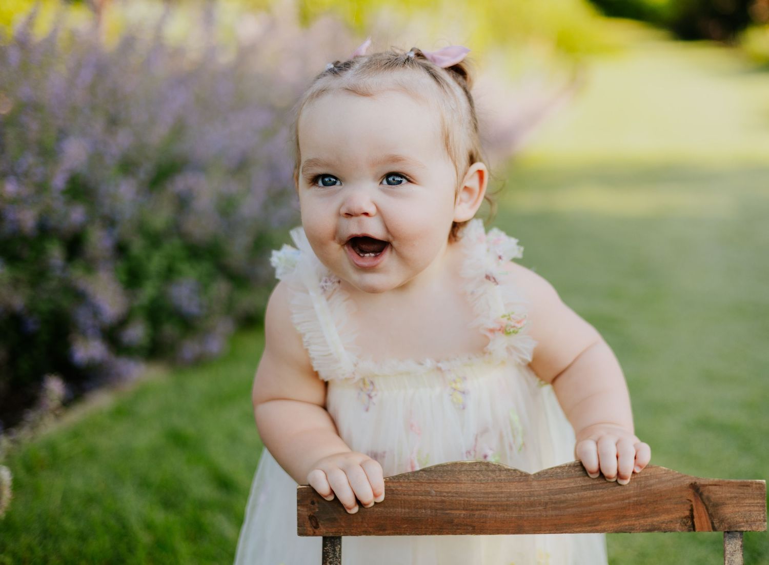 toddler with a fun smile with lavender