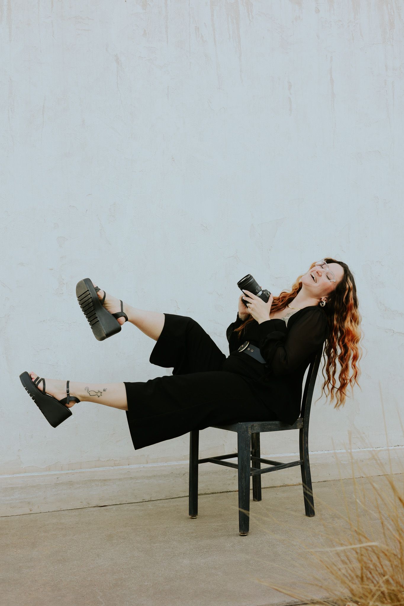 Photographer having fun in a chair