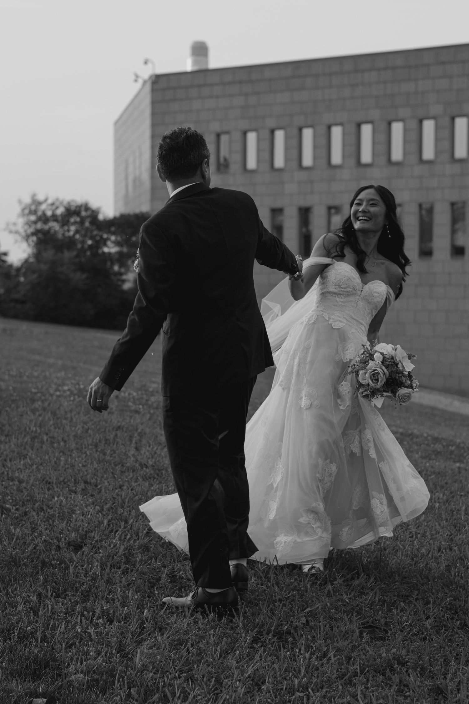 Couple spinning on wedding day in Ottawa