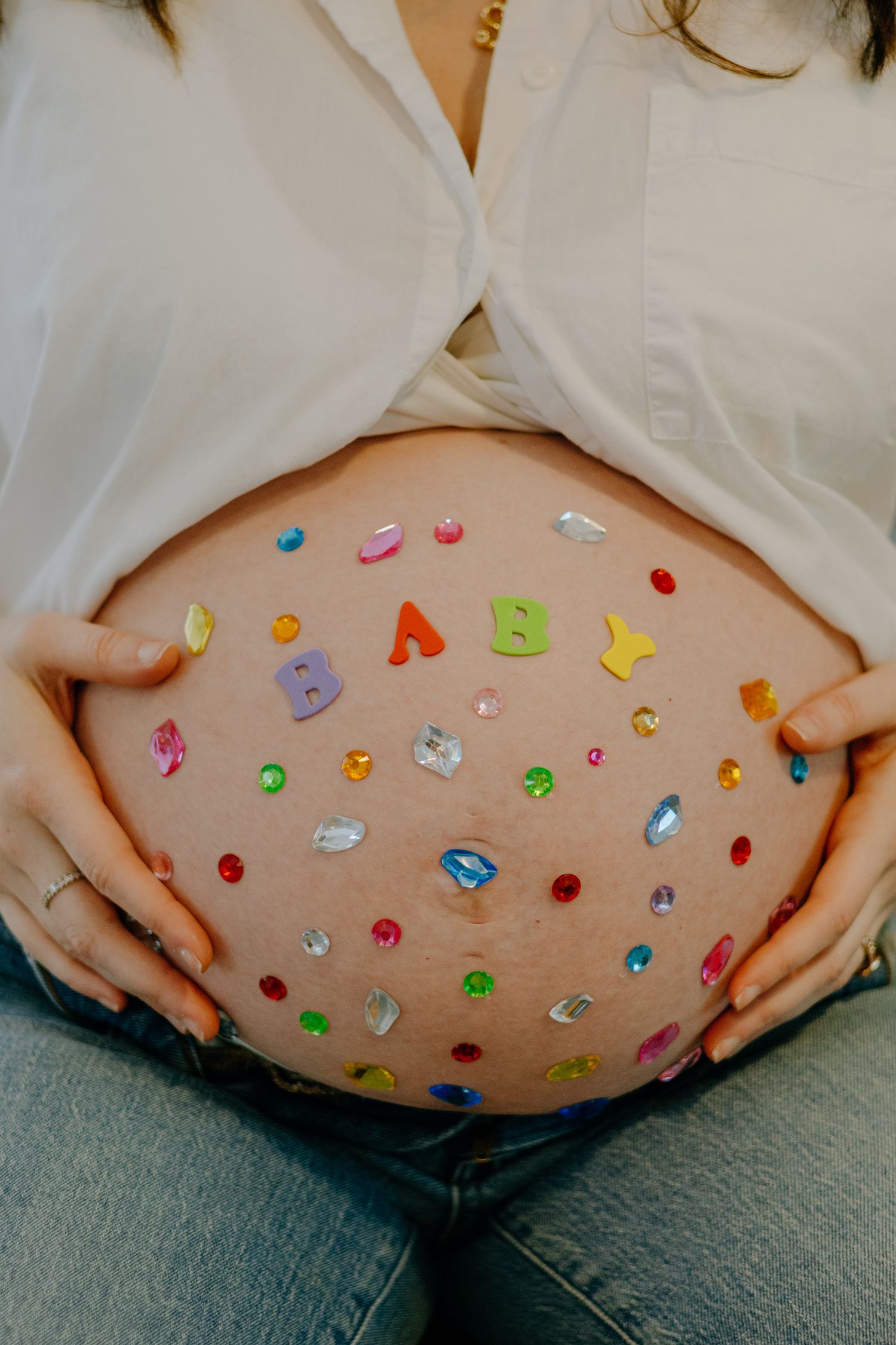 Baby bump photo with gems and stickers