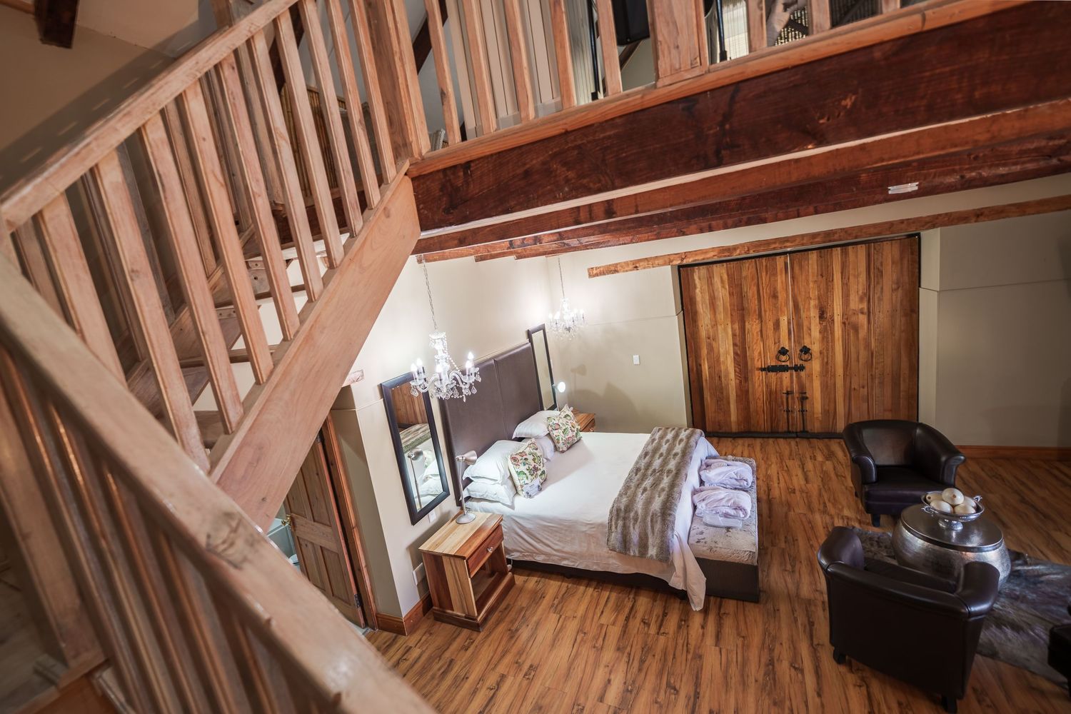 A downwards facing photo of a two-story room at Surval in Oudtshoorn