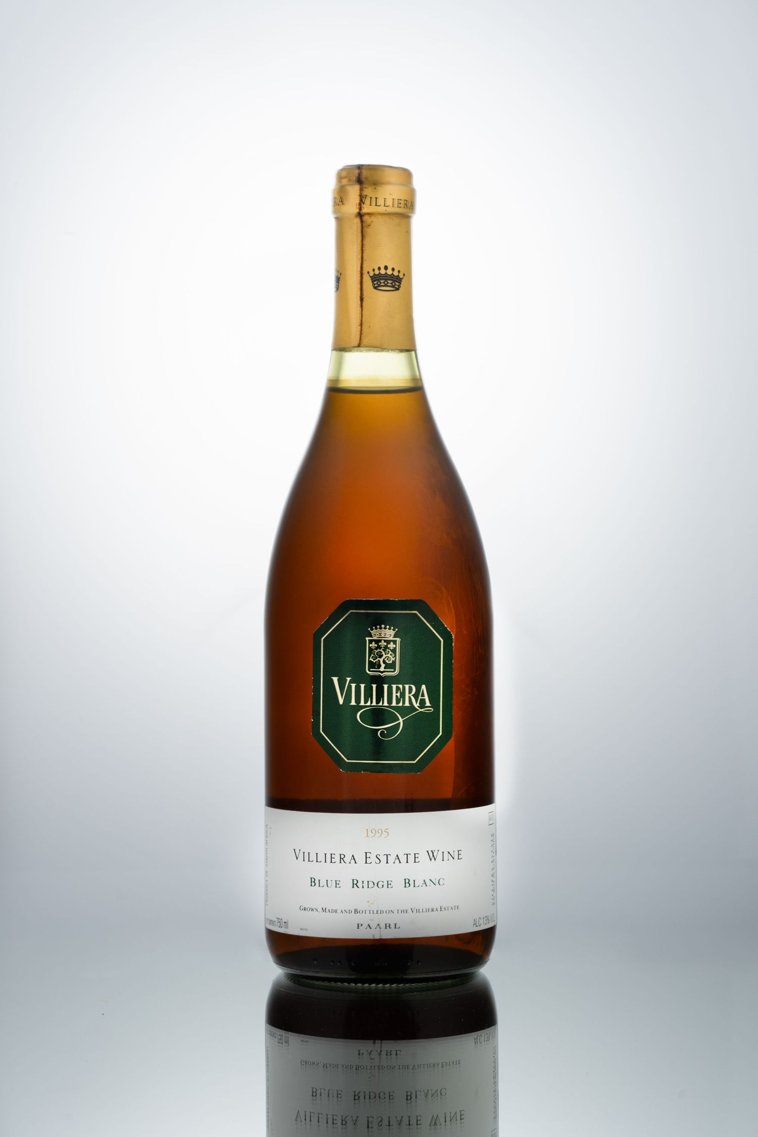 Villiera Estate wine bottles showcased in professional studio lighting against white backdrop.