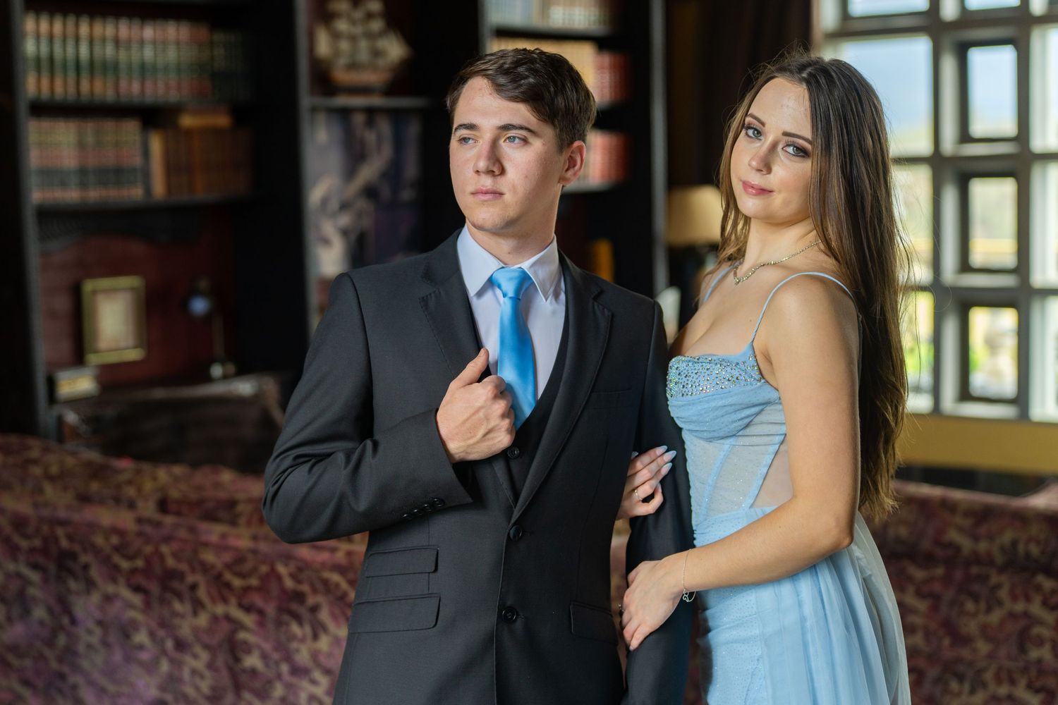 Matric farewell couple dressed formally inside a historic building