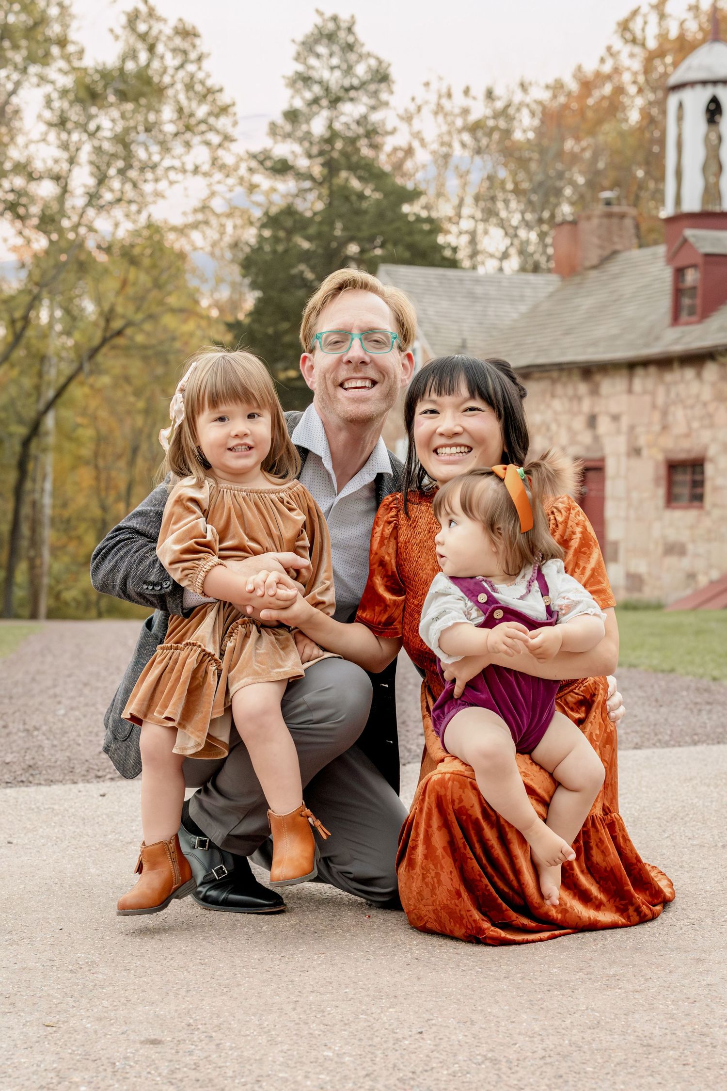 Upscale portrait of a family of four captured at Elizabeth Furnace, a luxury venue in Lititz PA