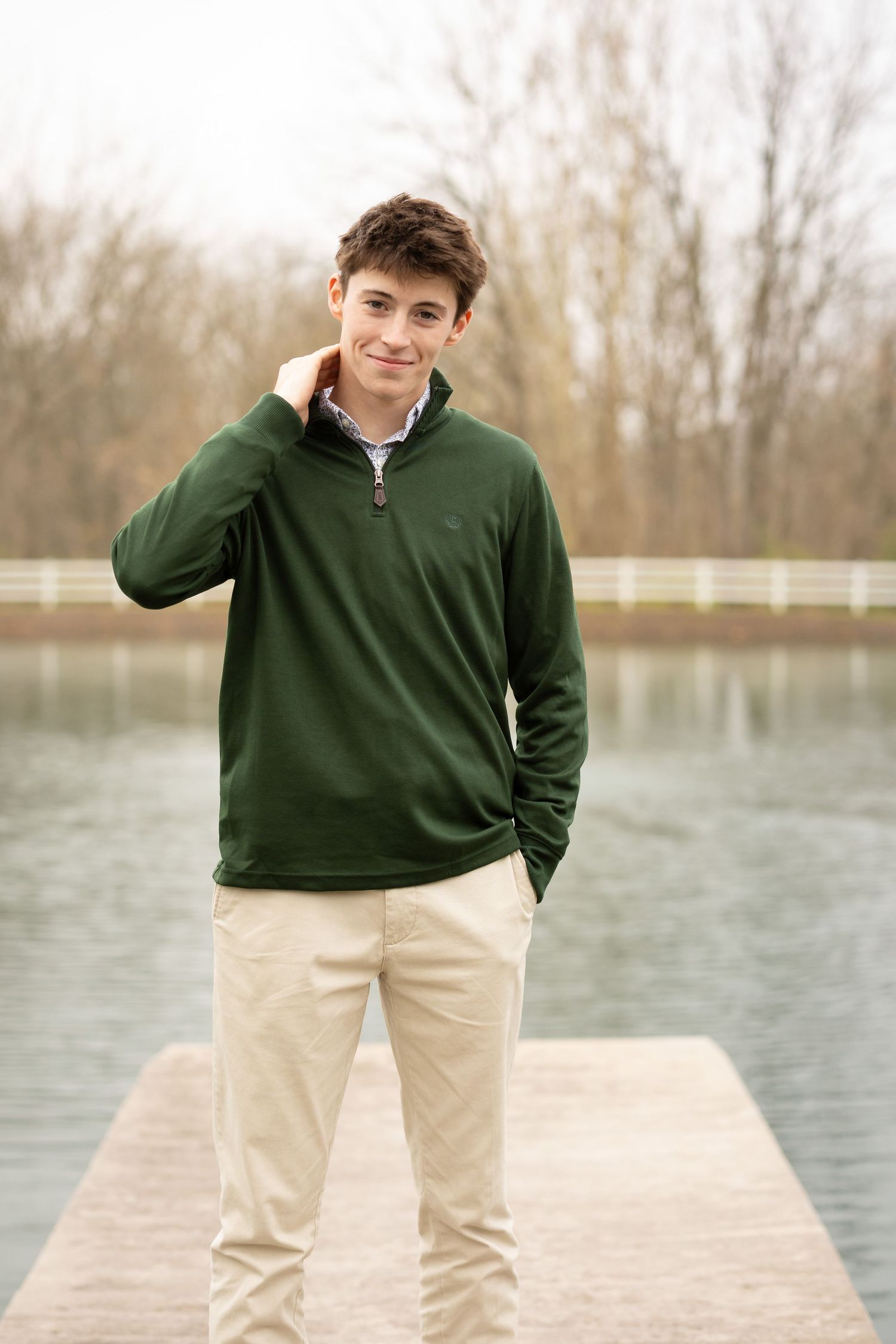 Senior portrait highlighting a composed expression and timeless styling