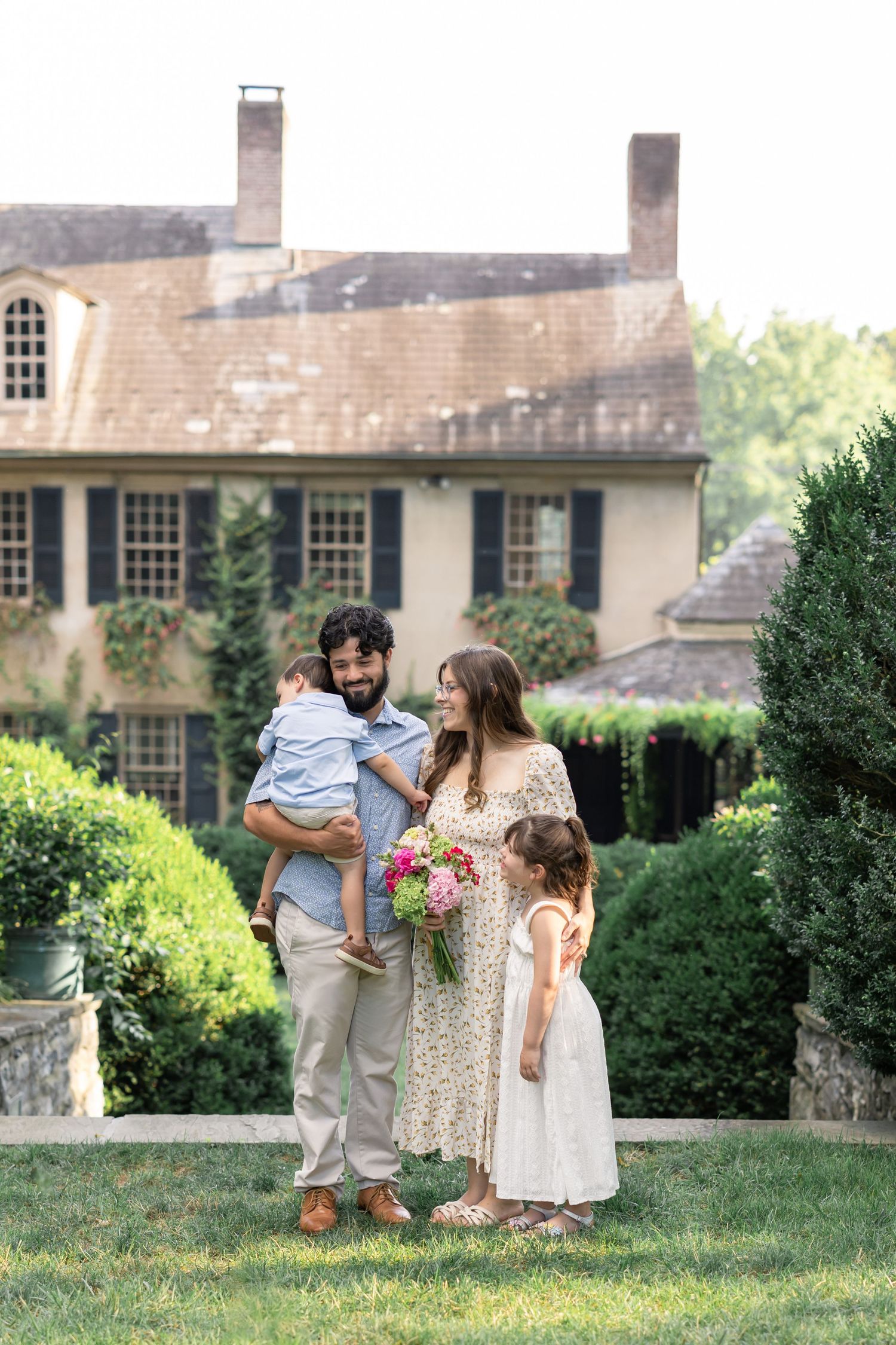 A candid family photo session at Conestoga House and Gardens in Lancaster, PA.