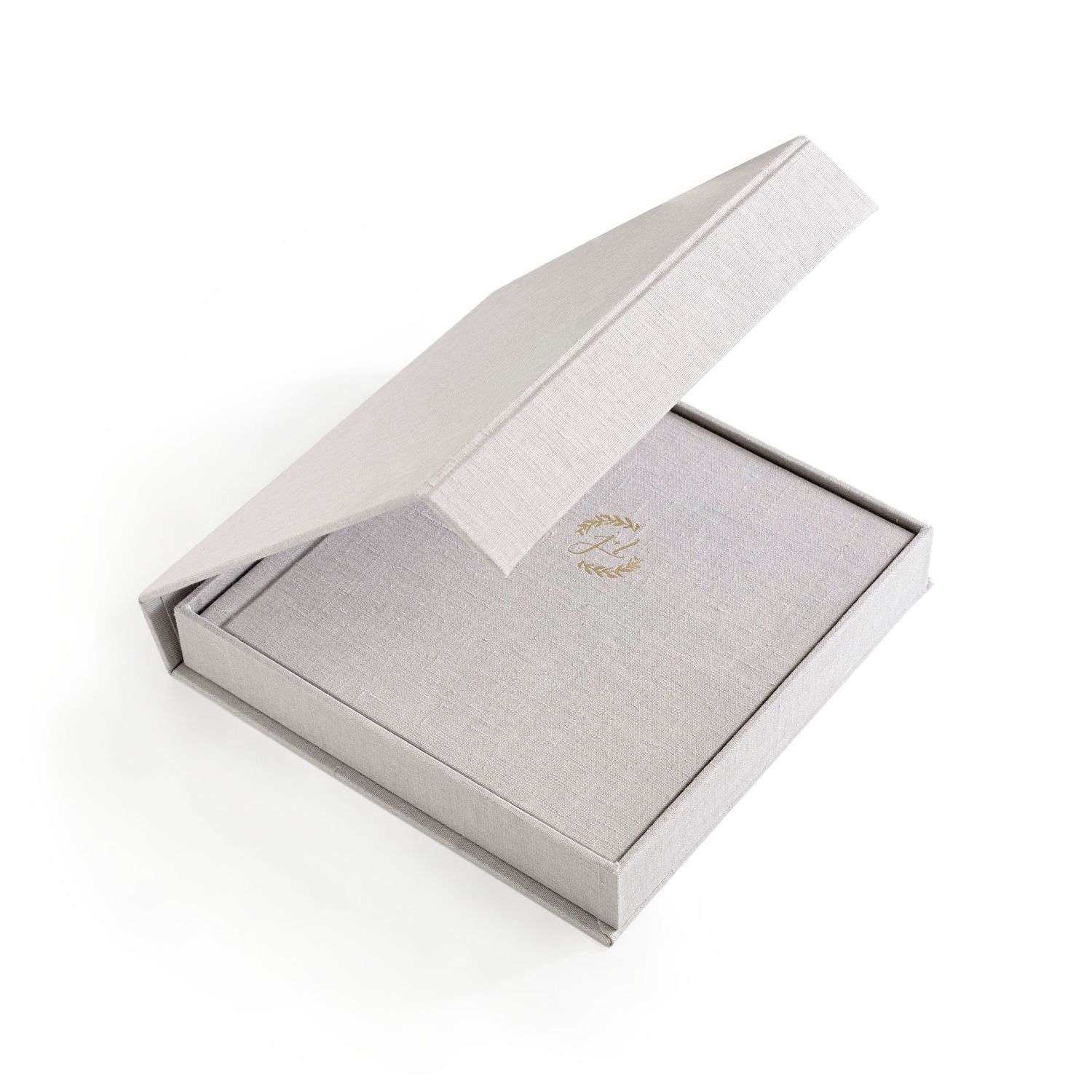 Four identical white minimalist product boxes shown at different angles on a white background.