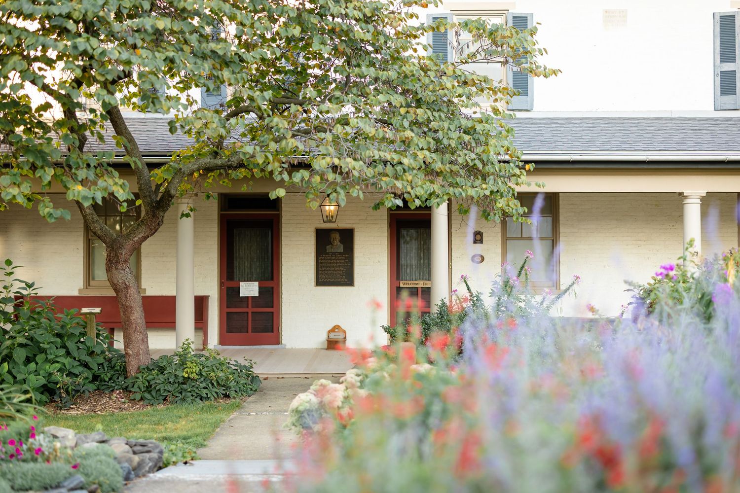 A historic building in Lancaster PA with lush gardens and stunning architecture.