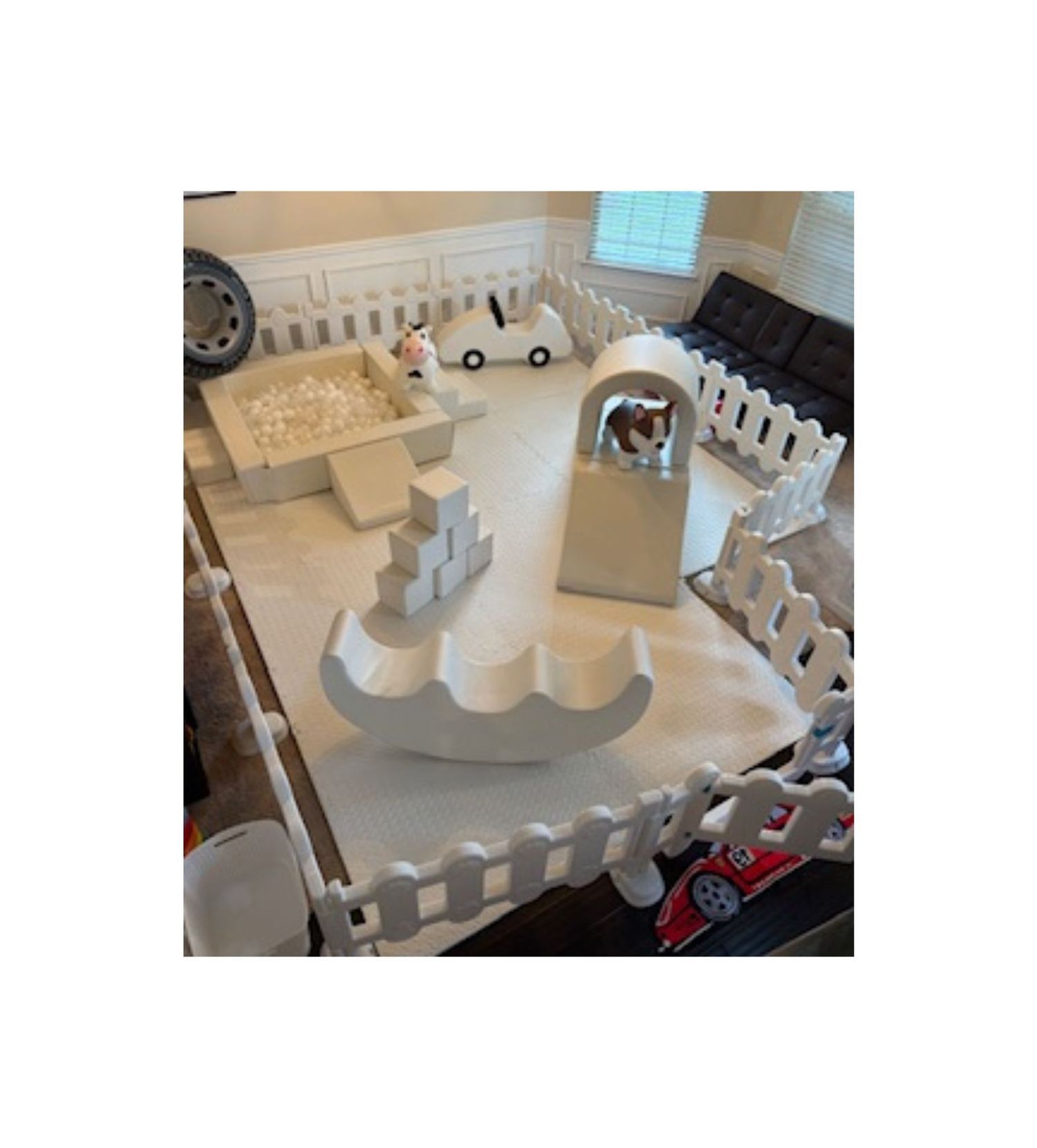 White 3D printed architectural model pieces showing various design elements and structural components on a work surface.