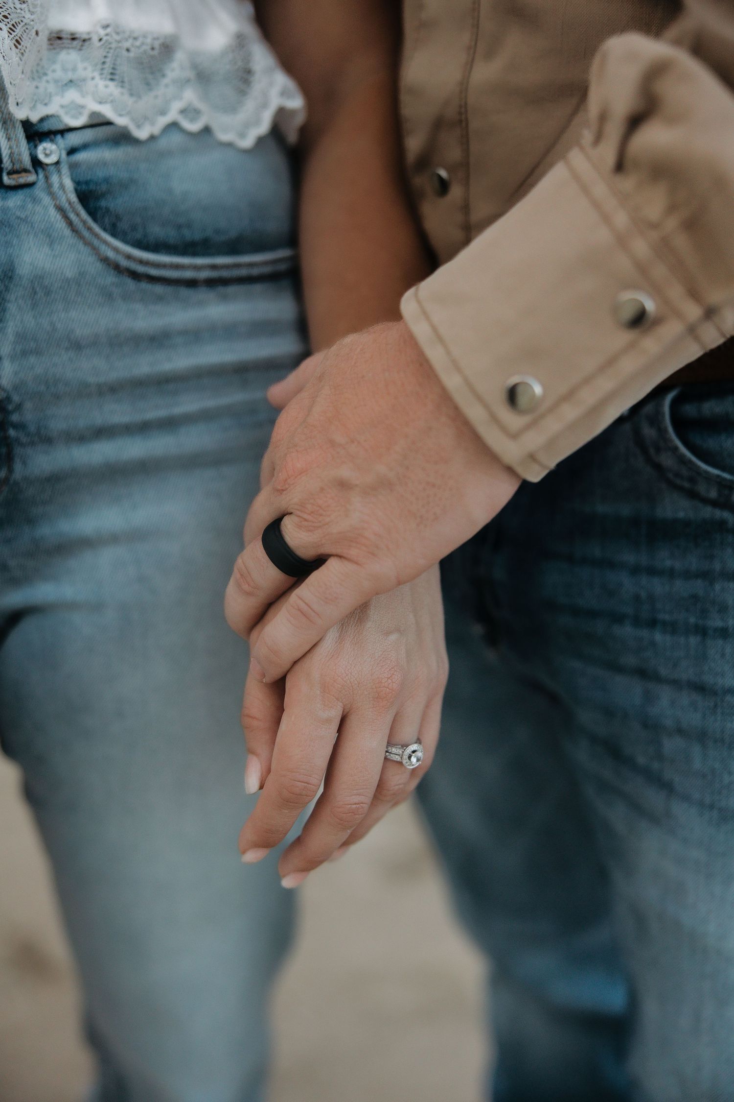Close-up series of hands with engagement ring detail against denim and khaki clothing.