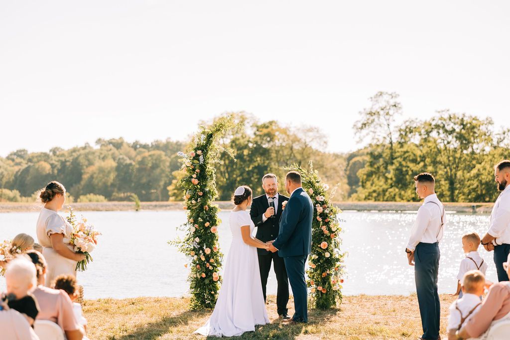 Wedding ceremony montage showing outdoor celebration by waterfront with floral archway at sunset.