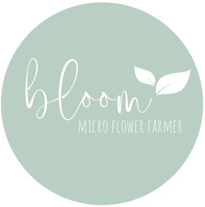 Soft sage green logo design for Bloom Micro Flower Farmer with white typography.
