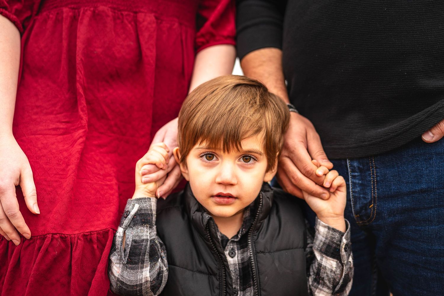 Close up of son and parents.  Family photoshoot.  fort Campbell, Kentucky.  Family photoshoot.