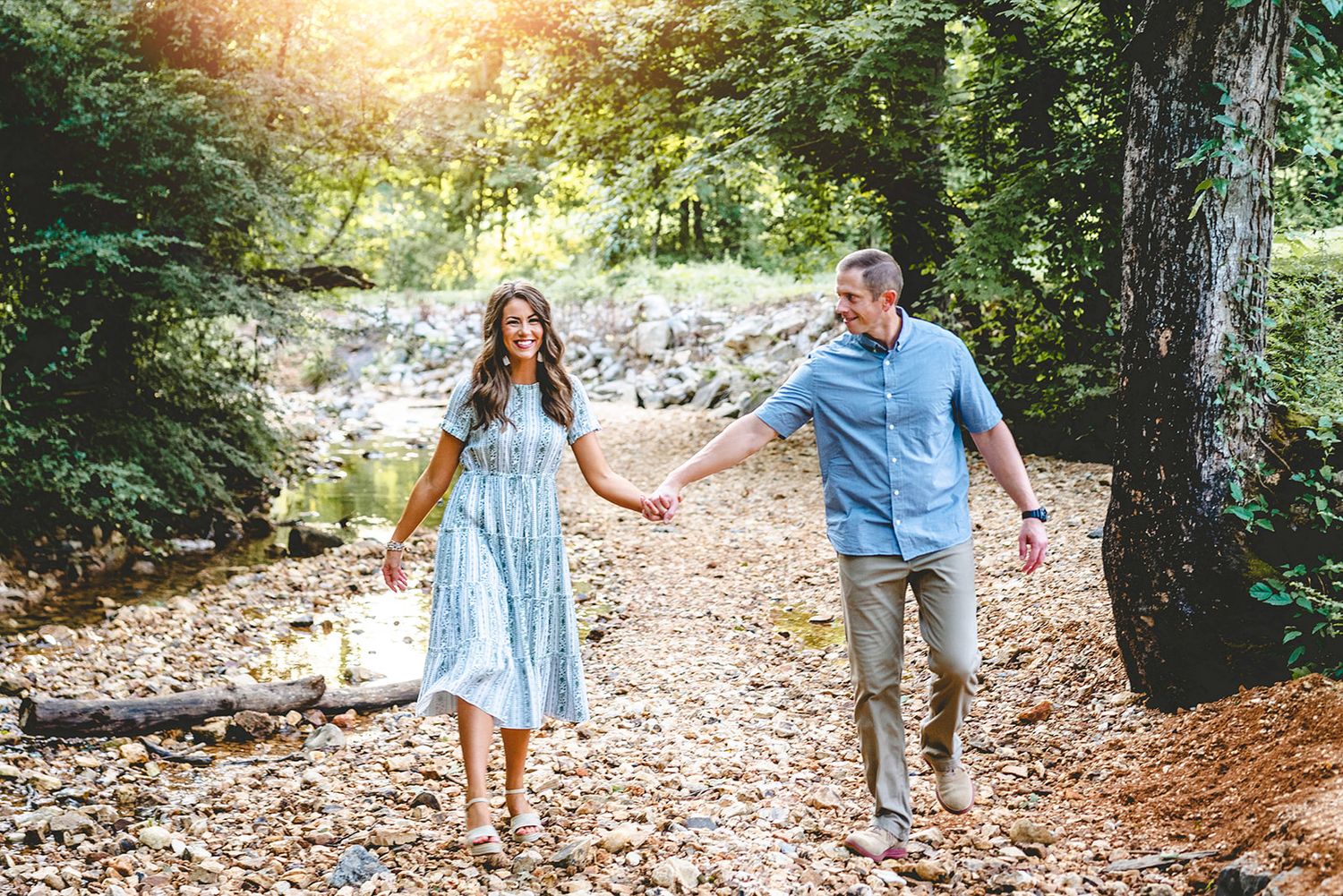 Clarksville, Tennessee photographer.  Family photos in a creek. Rotary Park, Tennessee.  Spring family photos.  Romantic photoshoot.