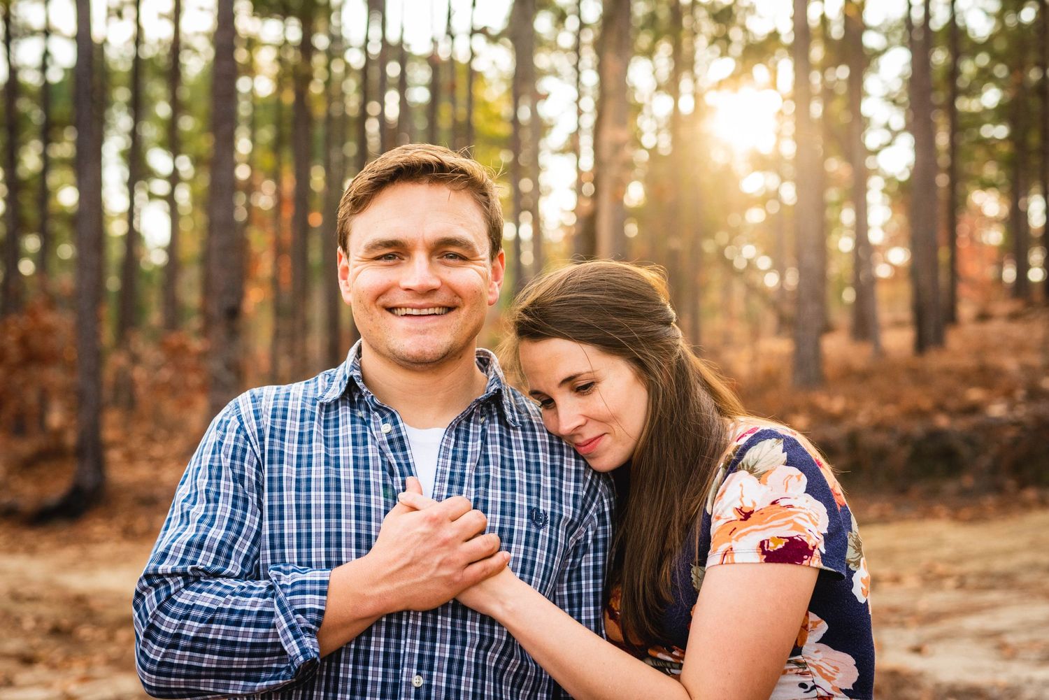 Husband and wife photo at sunset.  Fort Bragg, North Carolina.  Romantic couple photoshoot.