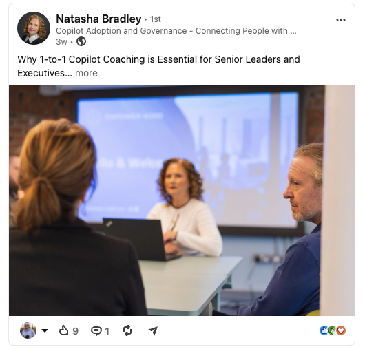 Senior leaders attend a 1-to-1 Microsoft Copilot coaching session in a modern office meeting room.