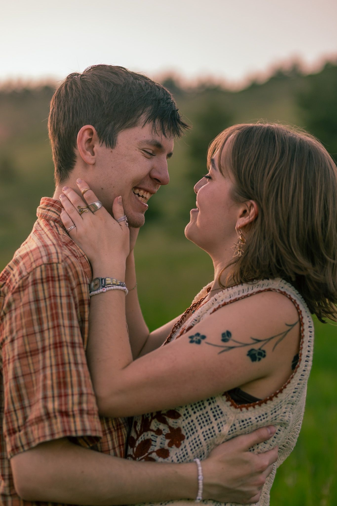 A couple with a mountainous backdrop in Fort Collins, Colorado.