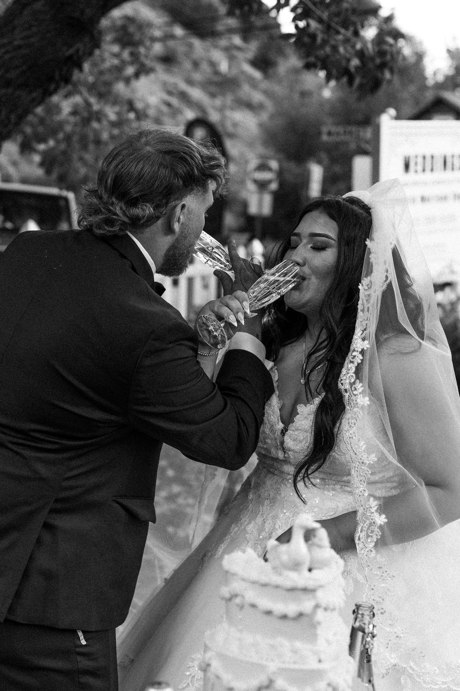 Northern Colorado wedding and couples photographer. Wedding day cutting the cake. Cinematic, romantic, and timeless photos.