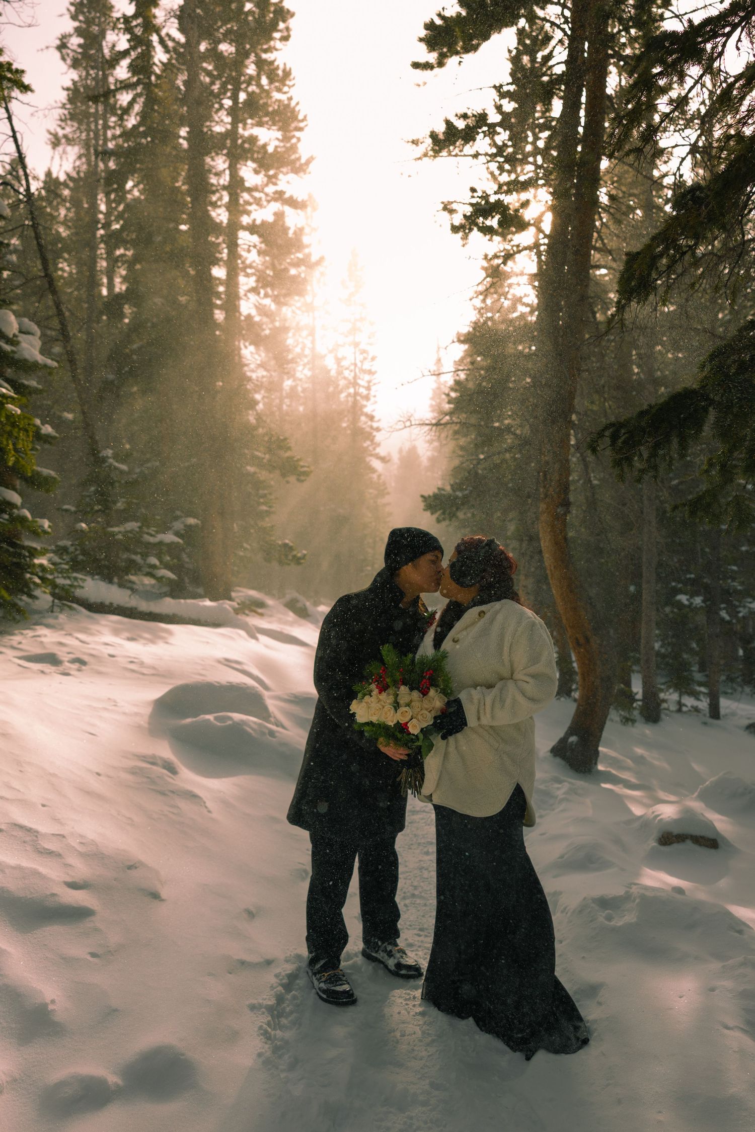 Northern Colorado wedding and couples photographer. Rocky Mountain National Park snowy elopement. Cinematic, romantic, and timeless photos.