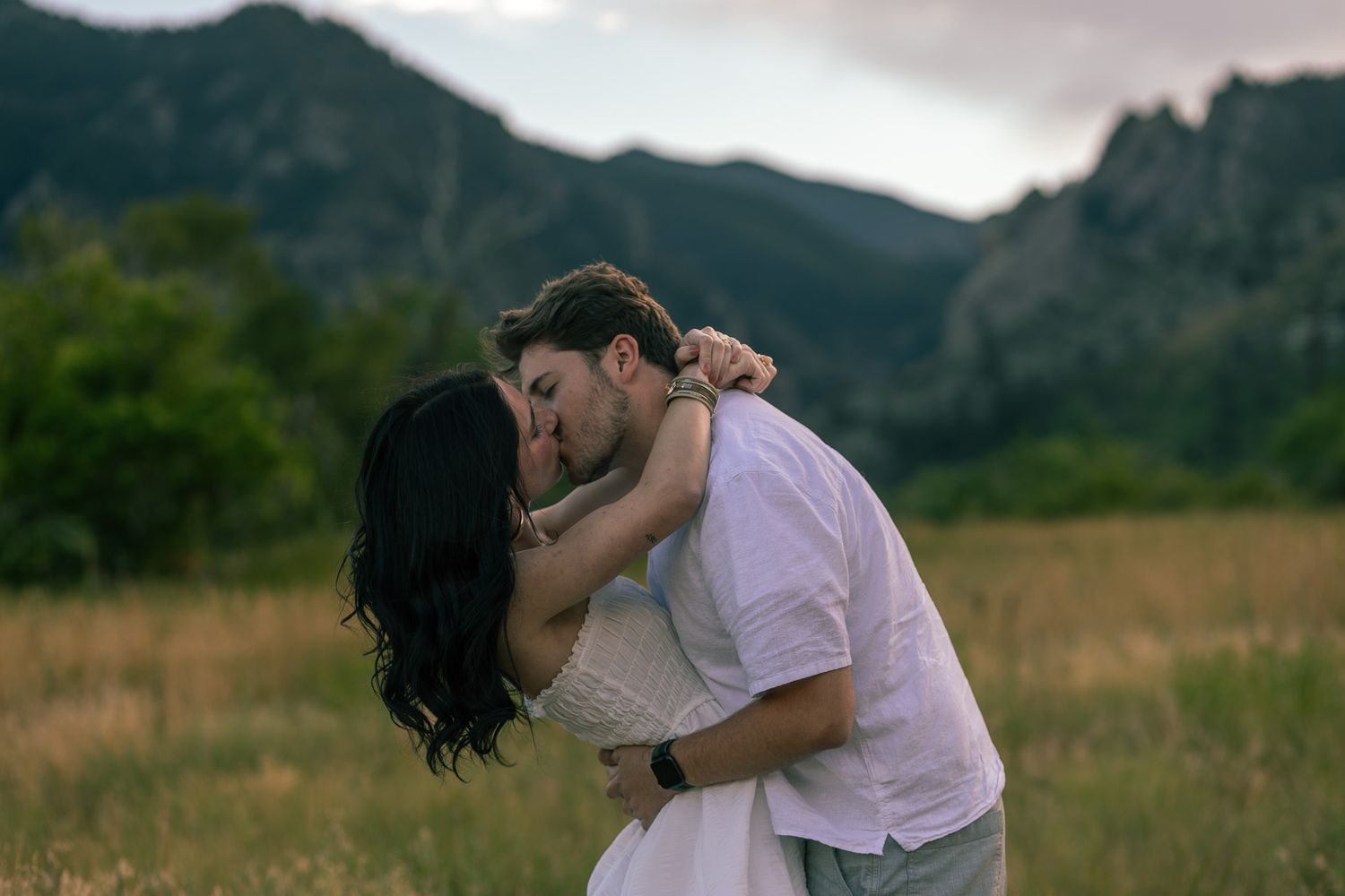 Candid moment captured between couple at romantic setting in Chautauqua Park | Colorado