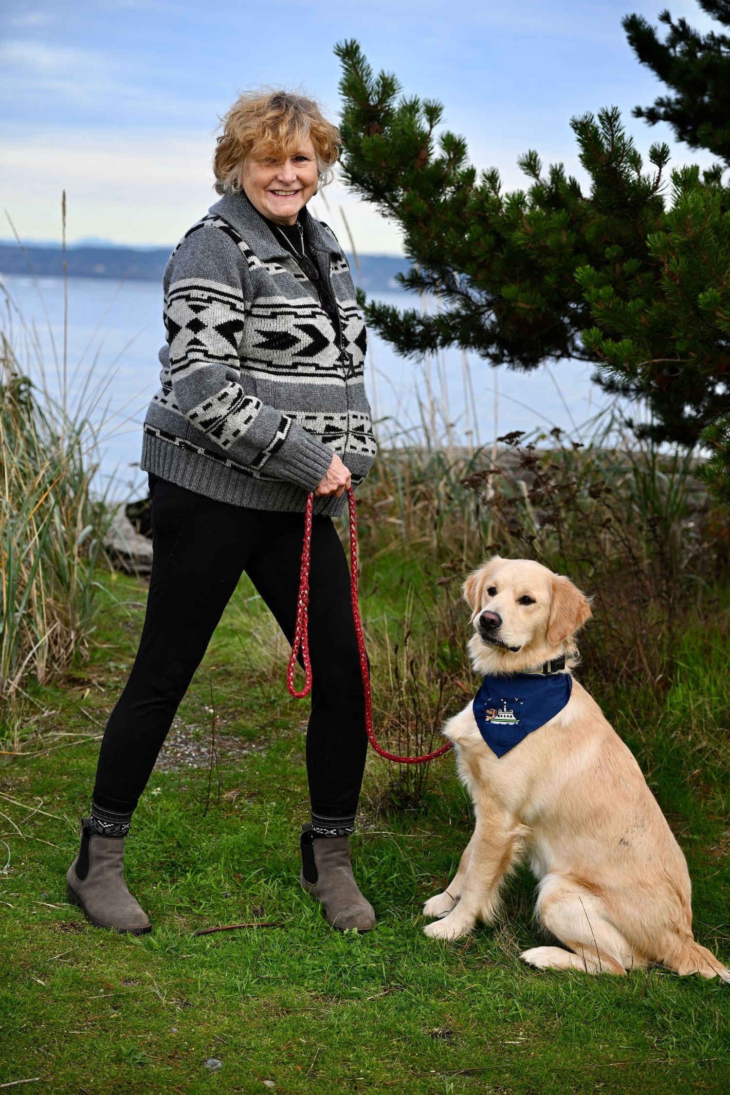 Family portrait session at Fay Bainbridge park on Bainbridge Island. WA. Ocean view with lady and golden retriever.