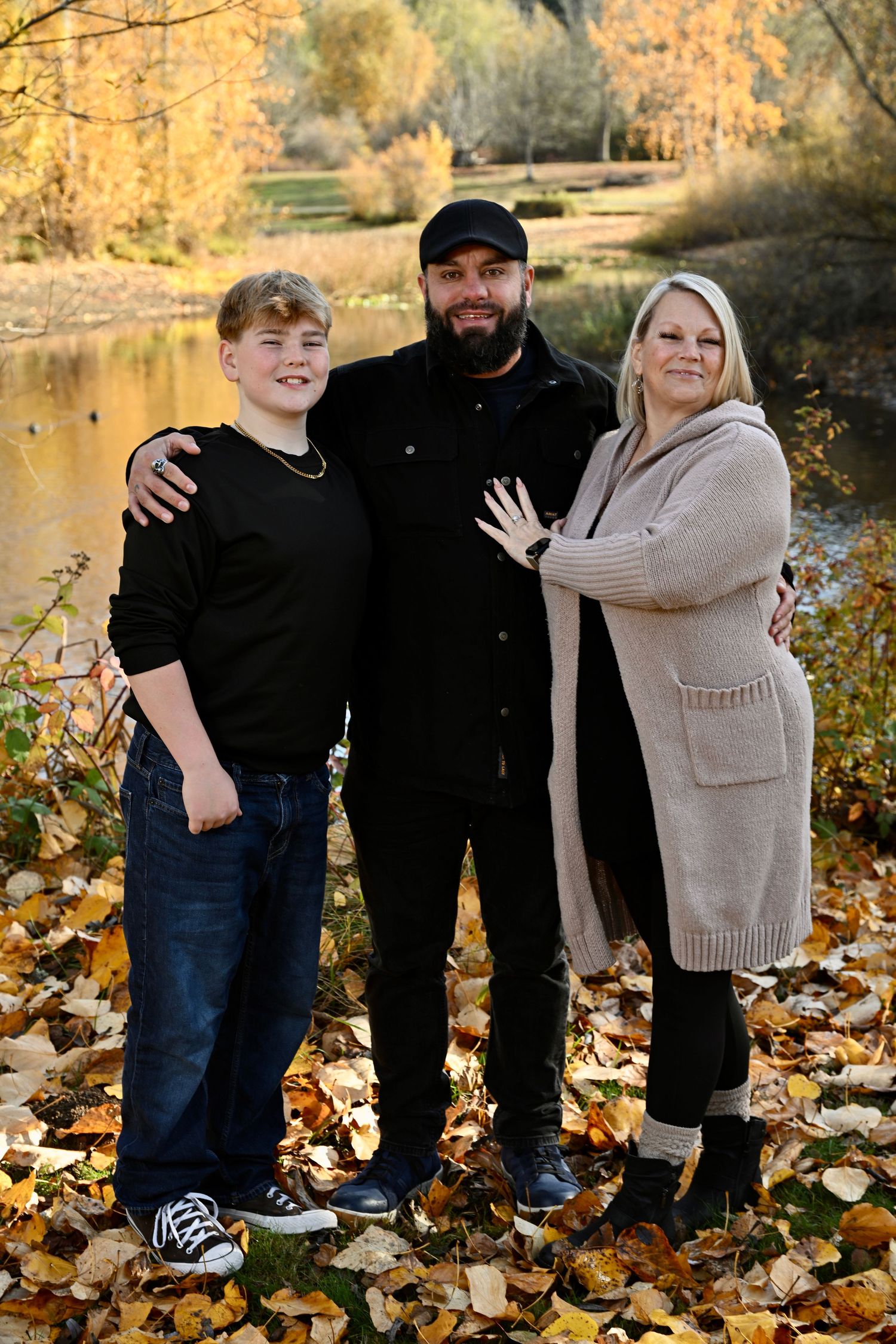 Family portrait session at Battle Point Park on Bainbridge Island, WA. Parents with son.